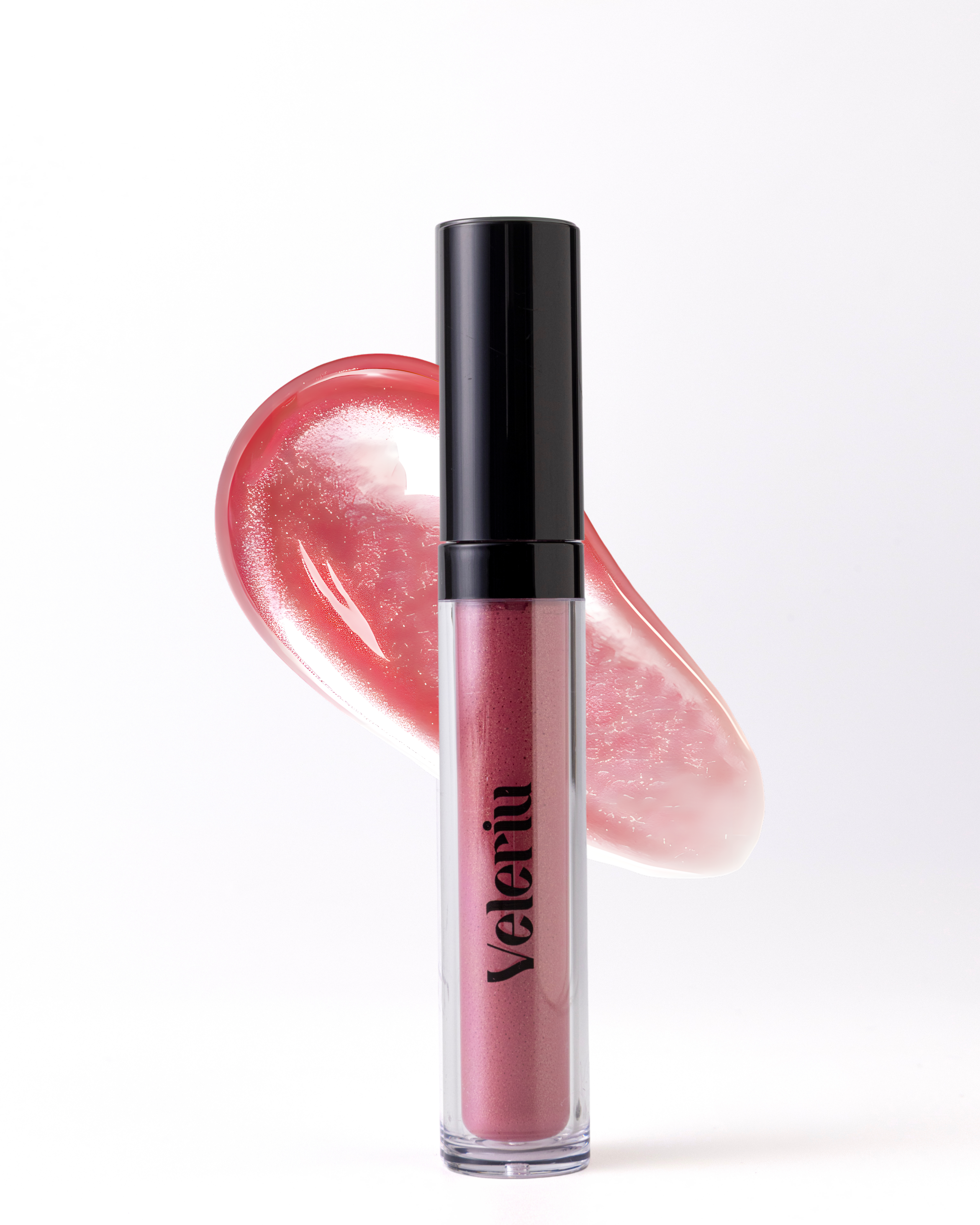 A soft, muted fuchsia plumping gloss called Posh, showing a neutral undertone and a sleek, balmy finish.