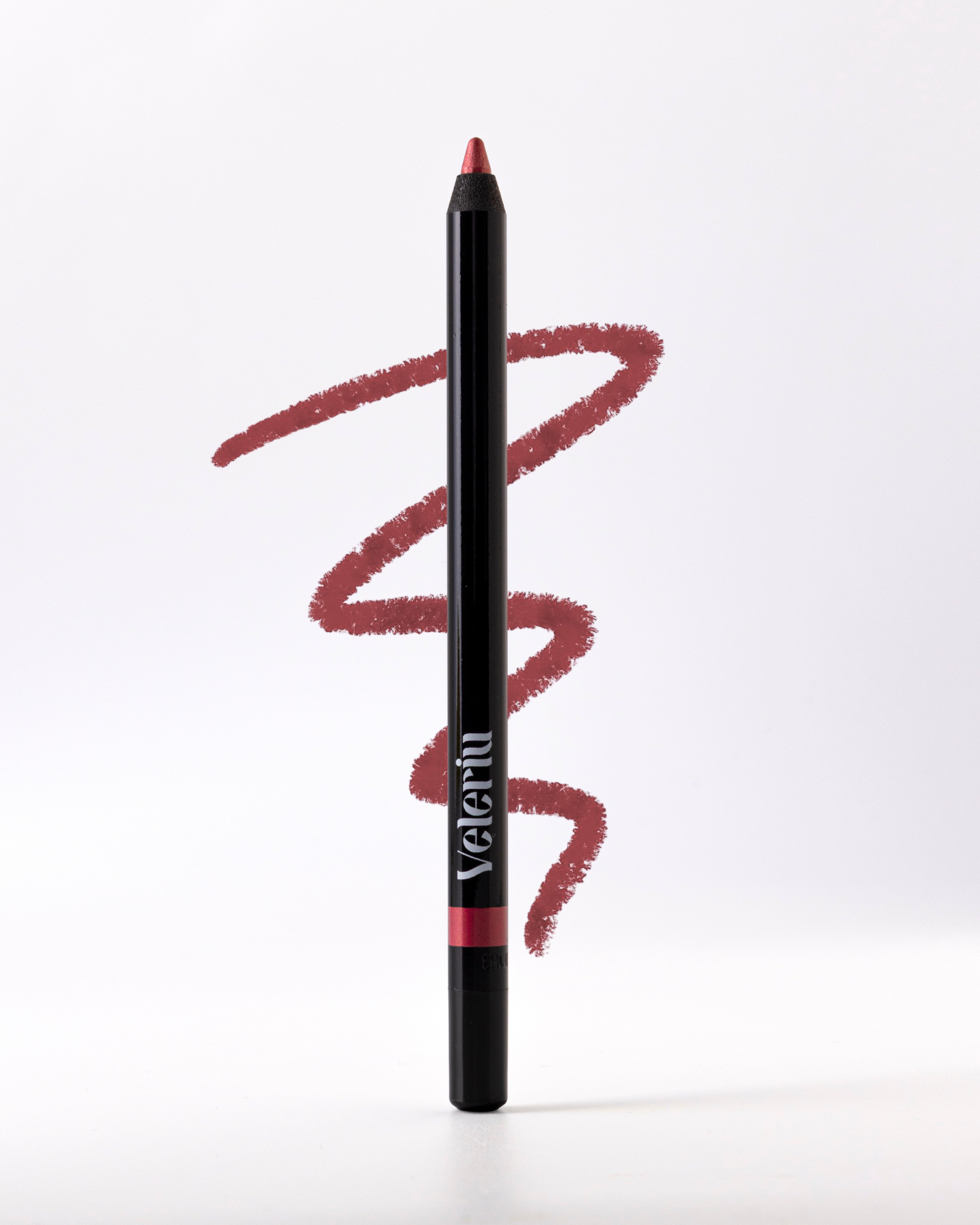 Waterproof lip liner in Holly Berry, a deep classic red for bold definition